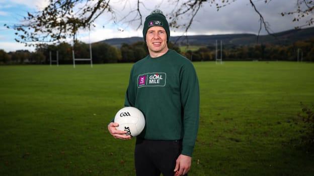 AIB, proud partner of the GOAL Mile, has teamed up with Kilkenny hurling captain Eoin Cody, left, and former Tyrone footballer, Seán Cavanagh to encourage communities in Ireland to ‘Step Up Together’ and take part in the GOAL Mile this Christmas.