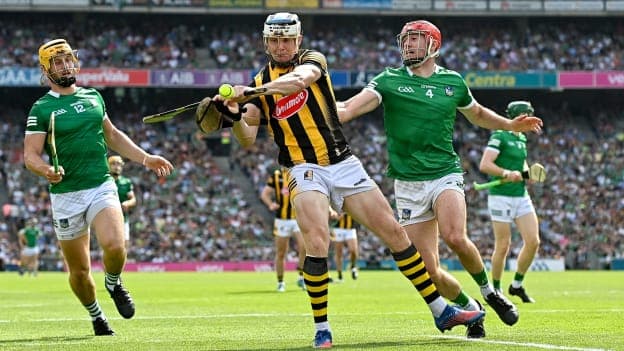 TJ Reid of Kilkenny is tackled by Barry Nash of Limerick during the 2022 GAA Hurling All-Ireland Senior Championship Final match between Kilkenny and Limerick at Croke Park in Dublin. Photo by Ramsey Cardy/Sportsfile