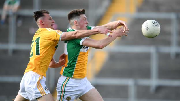 James Lalor, Offaly, and Kristian Healy, Antrim, collide during the All Ireland SFC Round One Qualifier.
