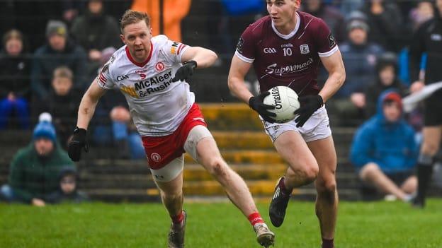 Matthew Tierney, Galway, and Frank Burns, Tyrone, in Allianz Football League action. Photo by Brendan Moran/Sportsfile