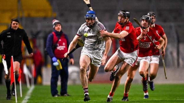 Conor Cooney, Galway, and Rob Downey, Cork, in Allianz Hurling League action at Páirc Uí Chaoimh.