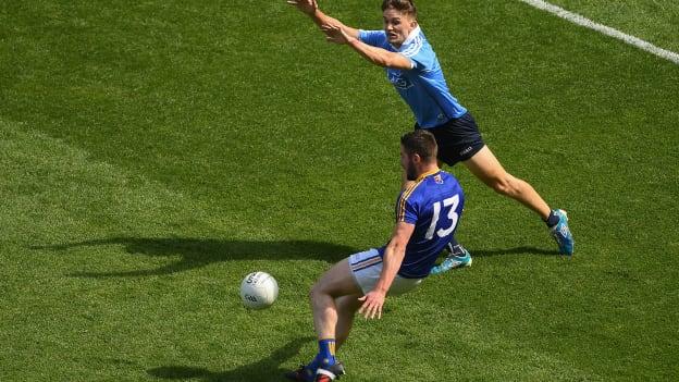 Dublin defender Michael Fitzsimons in action against Longford's Robbie Smyth in the Leinster SFC semi-final. 