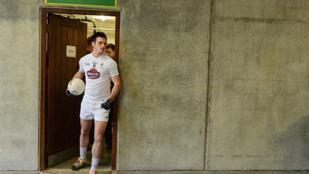 Eoin Doyle leading the Kildare out of the O Connor Park dressing rooms.