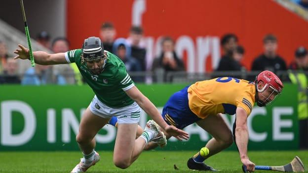 Gearoid Hegarty, Limerick, and John Conlon, Clare, in Munster SHC action.