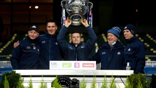 Dublin manager Dessie Farrell, centre, lifts the Sam Maguire Cup with selectors and coaches, from left, Mick Galvin, Brian O'Regan, Shane O'Hanlon and Darren Daly following the GAA Football All-Ireland Senior Championship Final match between Dublin and Mayo at Croke Park in Dublin. 