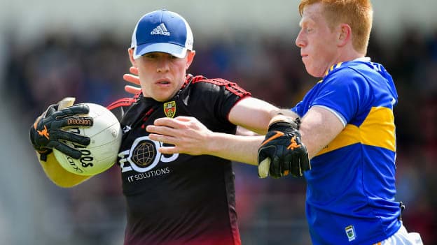 Rory Burns, Down, and Josh Keane, Tipperary, in All Ireland SFC Round One Qualifier action at Pairc Esler.