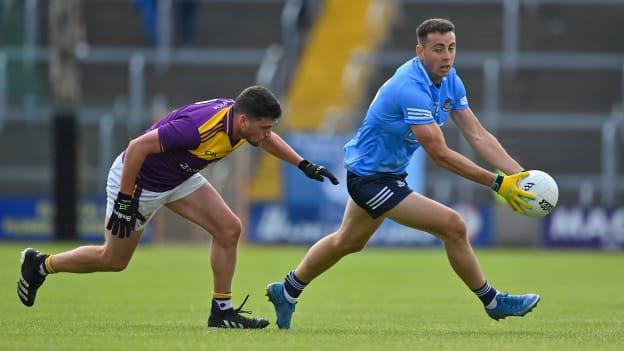 Cormac Costello, Dublin, and Liam O'Connor, Wexford, in Leinster Senior Football Championship action.