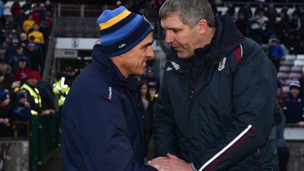 Anthony Cunningham and Kevin Walsh shake hands following Galway's Allianz Football League win over Roscommon at Pearse Stadium in March.