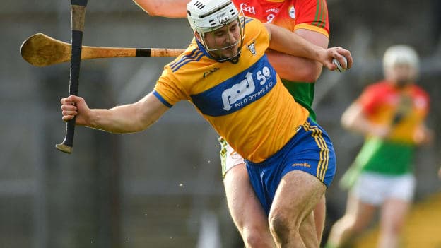 Pat O'Connor, Clare, and Edward Byrne, Carlow, in Allianz Hurling League action at Cusack Park.