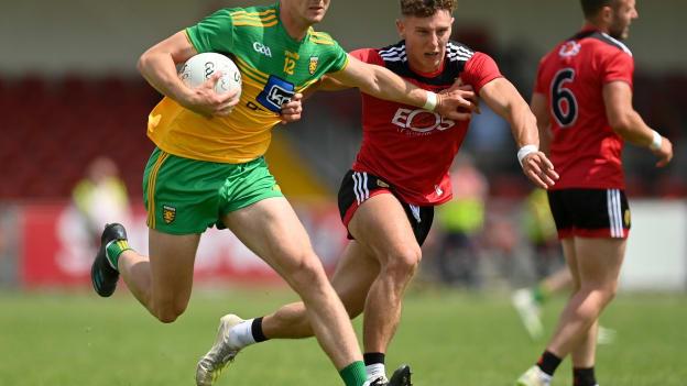 Michael Langan of Donegal in action against Pierce Laverty of Down during the Ulster GAA Football Senior Championship Preliminary Round match between Down and Donegal at Páirc Esler in Newry, Down. 