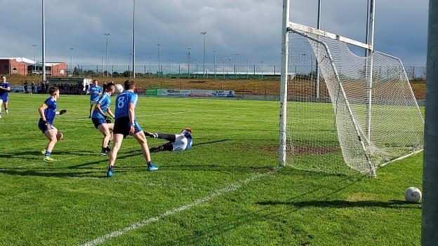 St. Joseph's goalkeeper Stephen McNevin shows his reflexes to deny Marist a second goal. 
