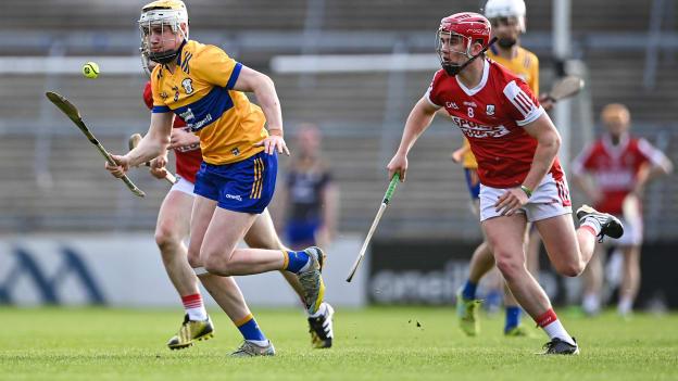 Seán Rynne, Clare, and Tadhg O'Connell, Cork, in action during the oneills.com Munster U20 Final at TUS Gaelic Grounds. Photo by Piaras Ó Mídheach/Sportsfile