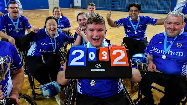 Maurice Noonan of Munster, centre, and team-mates celebrate after defeating Leinster during the M.Donnelly GAA Wheelchair Hurling All-Ireland Finals at National Indoor Arena in Abbotstown, Dublin. 
