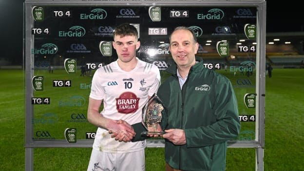 Man of the Match Ryan Sinkey of Kildare is presented with his award by Sean Kenny of Eirgrid after the 2023 EirGrid Leinster U20 Football Championship Final between Dublin and Kildare at Netwatch Cullen Park. Photo by Eóin Noonan/Sportsfile