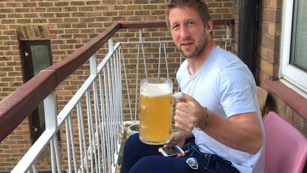 Cahir Healy enjoys a well-deserved cold beer after his test of sporting skill and stamina. 