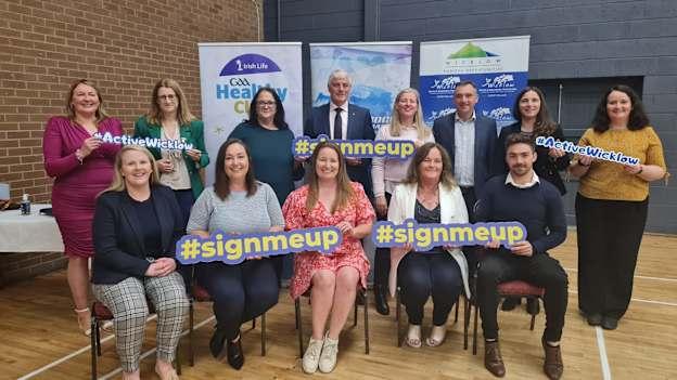 Back row L-R: Trina Murray (President Leinster LGFA), Hilda Breslin Uachtarán Camogie Association, Cllr Aoife Flynn Kennedy (Wicklow), David Murray (Wicklow CHWC Chairperson), Collette Coady (GAA Community & Health) Shay Cullen (Cllr Wicklow), Geraldine McTavish (GAA Diversity & Inclusion Officer), and Louise Burke (Director of Participation, Sport Ireland).

 

Front Row L-R: Louise Keane (Player Welfare & Inclusion Co-ordinator Camogie assoc.), Aisling Hubbard (Wicklow Sports & Recreation Partnership), Clara Jenkinson (Wicklow Sports & Recreation Partnership - SIDO), and Rita Brady (An Tochar GAA HCO).