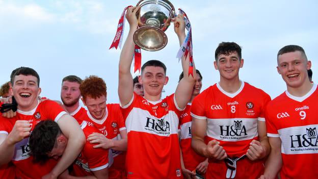 Derry captain Matthew Downey lifts the cup as he celebrates with team-mates after their side's victory in the Electric Ireland Ulster GAA Football Minor Championship Final 2020 match between Monaghan and Derry at Healy Park in Omagh, Tyrone.
