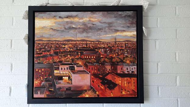 David Sweeney's framed oil-painting, ‘Dublin’s Northside from the roof-tops of Croke Park’. 