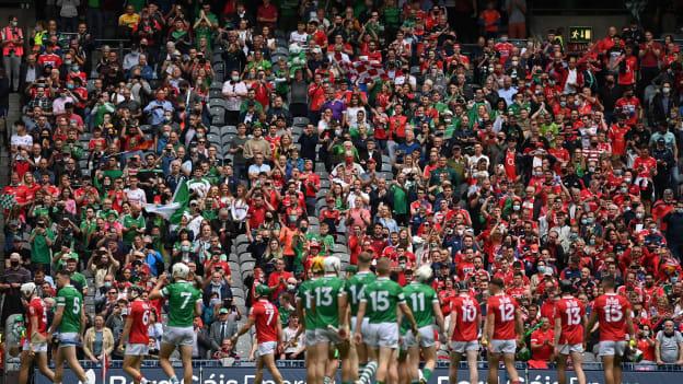 Supporters watch the parade before the GAA Hurling All-Ireland Senior Championship Final match between Cork and Limerick in Croke Park, Dublin. 