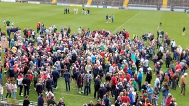 Crotta O'Neill's players and supporters celebrate at Austin Stack Park.