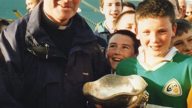 Brother Dormer presents the 2005 Mackey Cup to West Limerick captain Declan Hannon.