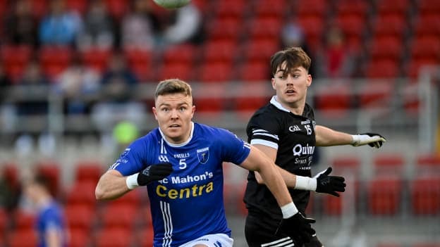 Conor McCarthy, Scotstown, and Ceilum Doherty, Kilcoo, in AIB Ulster Club SFC action at Páirc Esler. Photo by Stephen Marken/Sportsfile