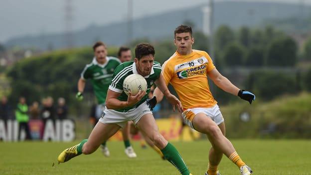 Padraig Browne and Patrick McBride during the Round 1B qualifier at Corrigan Park.