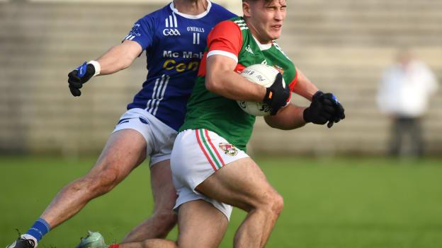 Shane Hanratty, Inniskeen, and Shane Carey, Scotstown, in Monaghan SFC Final action. Photo by Philip Fitzpatrick/Sportsfile