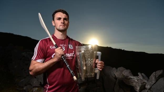 Galway hurler Johnny Coen pictured with the Liam MacCarthy Cup at the launch of the All-Ireland Senior Hurling Championship on Dún Aonghasa, Inis Mór. 