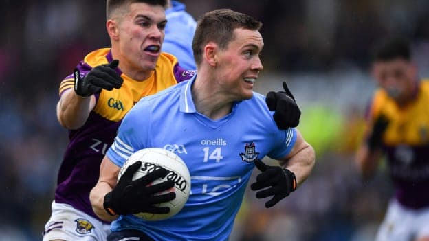 Con O'Callaghan, Dublin, and Eoin Porter, Wexford, in Leinster SFC action.