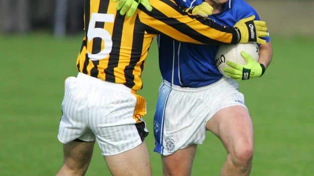 Paul O'Hagan, Clan na Gael, and Aaron Kernan, Crossmaglen Rangers, in action during the 2006 Armagh SFC Final.