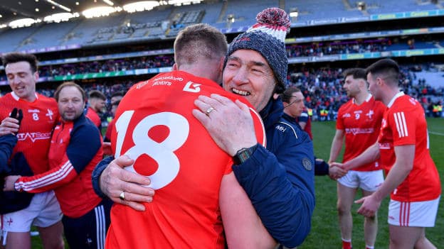 Louth manager Mickey Harte celebrates with Ciarán Byrne after their side's victory in the Allianz Football League Division 3 Final match between Louth and Limerick at Croke Park in Dublin. 