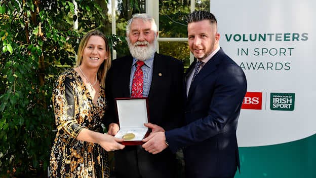 Seamus Spaight of Meelick GAA, Co. Clare, is presented with his award by Mary O'Connor, CEO of the Federation of Irish Sport, and Richard Gernon, Regional Manager EBS, during the Volunteers in Sport Awards presented by Federation of Irish Sport with EBS at Farmleigh House in Phoenix Park, Dublin. 