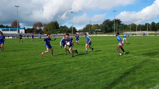 Marist midfielder Shane Lawless looks for support from his colleagues. 