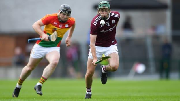 Brian Concannon, Galway, and John Michael Nolan, in action during the Leinster Senior Hurling Championship clash at Pearse Stadium.