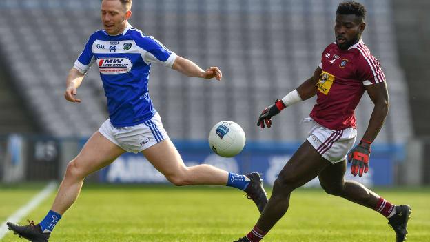 Paul Cahillane, Laois, and Boidu Sayeh, Westmeath, during the Allianz Football League Division Three Final at Croke Park.