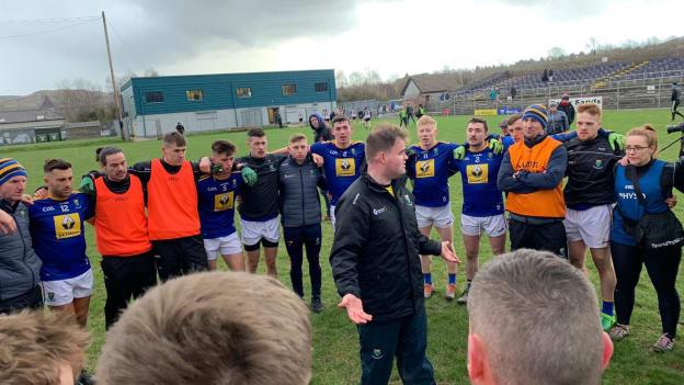 Wicklow manager, Davy Burke, talks to his players after victory over Sligo in Division Four of the Allianz Football League today. 