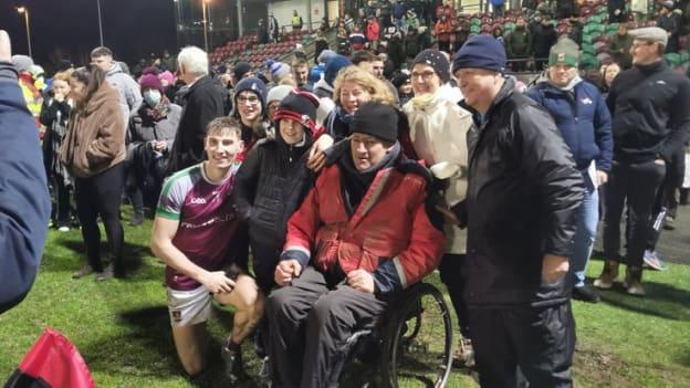 Matthew Tierney pictured with his father Matt after captainin NUIG to the 2022 Sigerson Cup. 