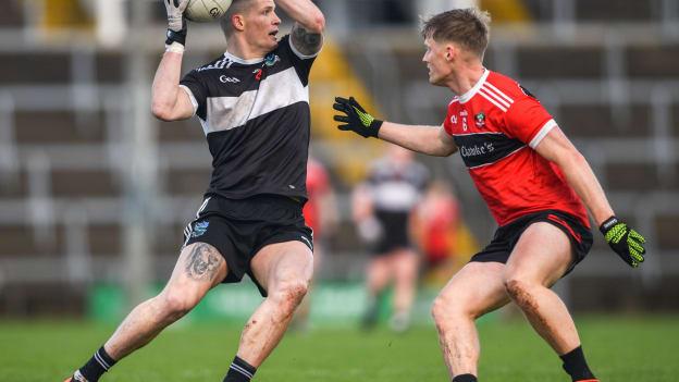 Iain Corbett, Newcastle West, and Shane Doherty, Adare, in Limerick SFC Final action. Photo by Tom Beary/Sportsfile