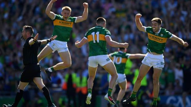 Seán O'Shea of Kerry and his team mates Killian Spillane, left, and Adrian Spillane celebrate as referee Paddy Neilan blows the full time whistle to end the GAA Football All-Ireland Senior Championship Semi-Final match between Dublin and Kerry at Croke Park in Dublin.