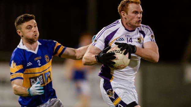 Mark Vaughan, Kilmacud Crokes, and Tom Quinn, Castleknock, in action at Parnell Park.