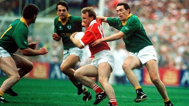 Teddy McCarthy of Cork in action against Brian Stafford, right, and PJ Gillic of Meath during the 1990 All-Ireland Senior Football Championship Final match between Cork and Meath at Croke Park in Dublin. Photo by Ray McManus/Sportsfile.
