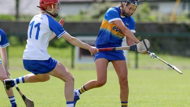 Ereena Fryday, Tipperary, and Beth Carton, Waterford, in Littlewoods Camogie League action.