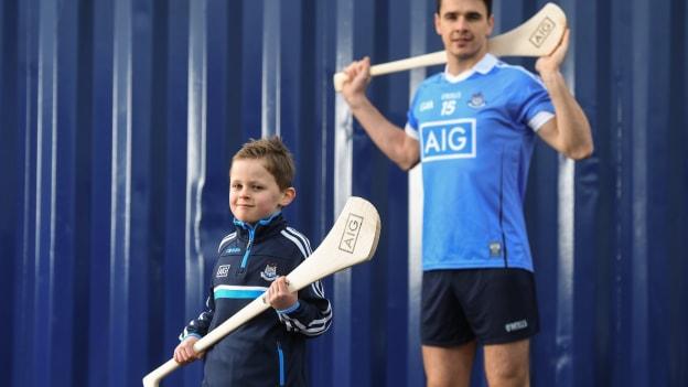  Dublin hurler Danny Sutcliffe with young Dub, Dara Ryan, age 7, in Parnell Park to kick off the 2018 Dublin GAA Season with team sponsor’s AIG Insurance.