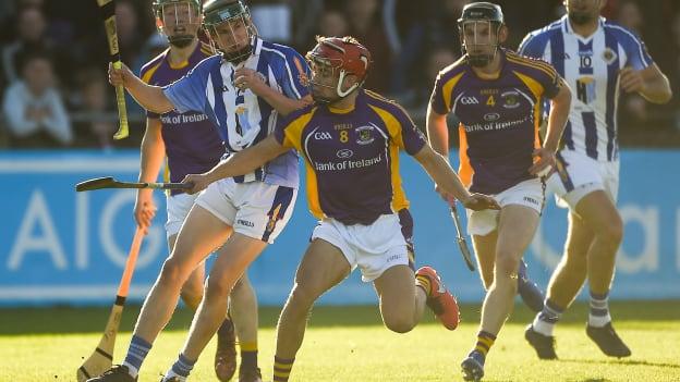 Aidan Mellett, Ballyboden St Enda's, and Lorcan McMullan, Kilmacud Crokes collide at Parnell Park.