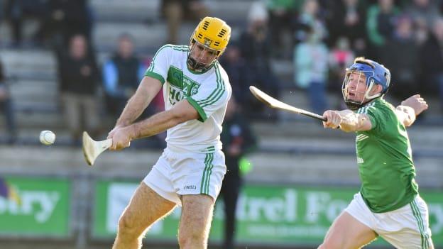 Colin Fennelly of Ballyhale Shamrocks scores his second goal despite the effort of Brendan Travers of Naomh Éanna during the AIB Leinster GAA Hurling Senior Club Championship semi-final.