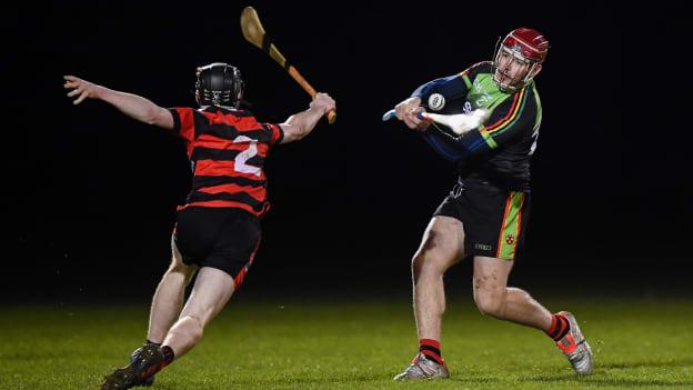 Jerry Kelly, IT Carlow, and Michael Conroy, Trinity College, in Electric Ireland Fitzgibbon Cup action.