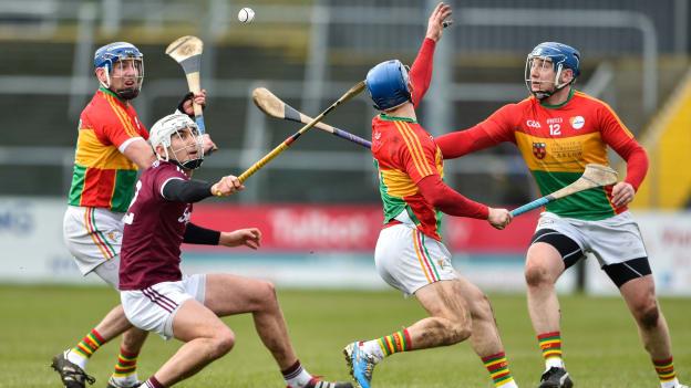 Jason Flynn of Galway in action against Eoin Nolan, Michael Doyle and Seamus Murphy of Carlow during the Allianz Hurling League Division 1B Round 2 match between Carlow and Galway at Netwatch Cullen Park in Carlow. 