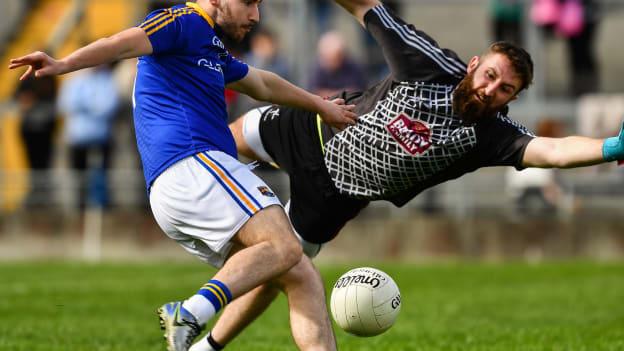 Mark Hughes of Longford beats the Kildare goalkeeper Mark Donnellan to score a goal in the 54th minute of the GAA Football Senior Championship Quarter-Final match between Longford and Kildare at Bord na Mona O’Connor Park in Tullamore, Offaly. 