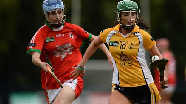 Katie Cahill of Middle East in action against Fiona Monaghan of Canada during Day 3 of the Etihad Airways GAA World Games 2016 at UCD in Dublin.